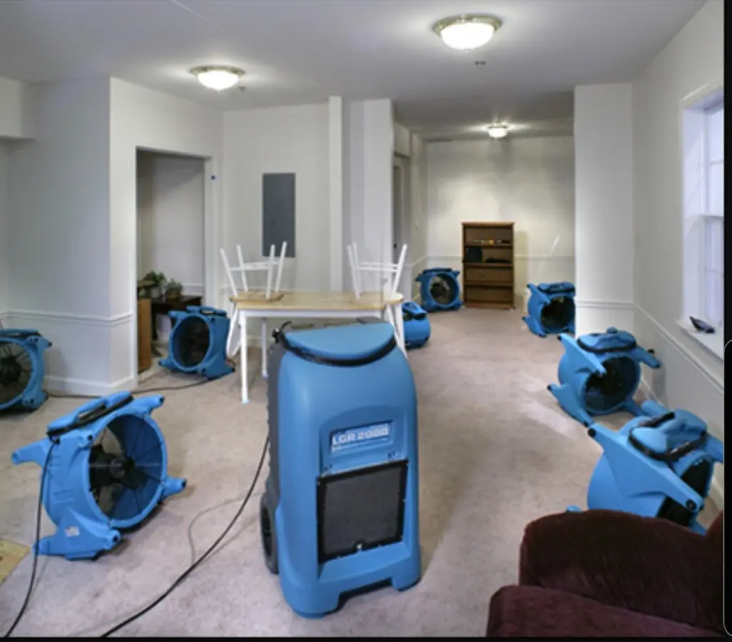 Air movers and dehumidifier setup for Water Damage Restoration in Lima